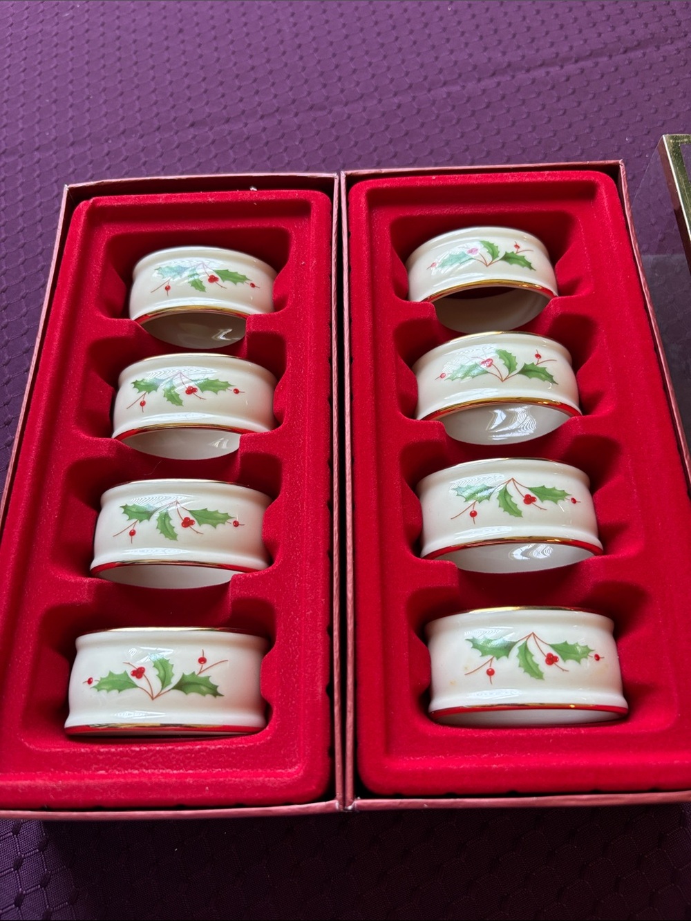 Like new set of 8 Lenox “Holiday” napkin rings in original boxes